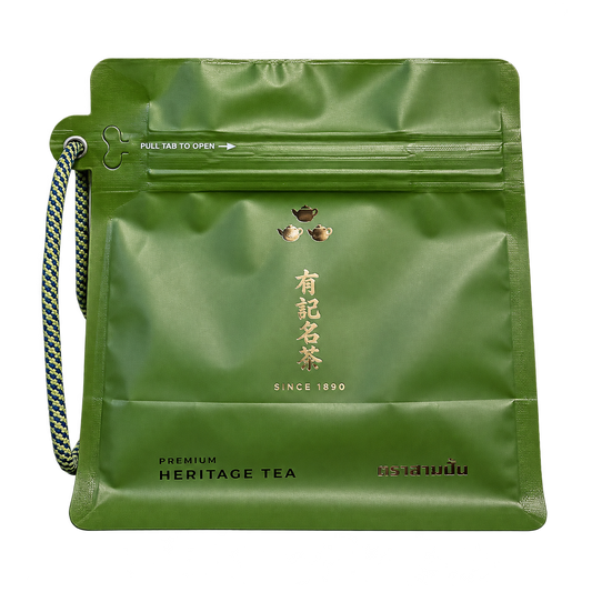 Heritage Tea green pouch — background removed